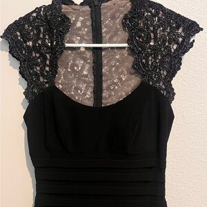 Black mini bodycon dress with lace detail